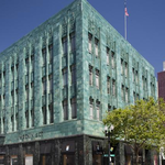 Oakland Tribune Tower owner flips another historic office building